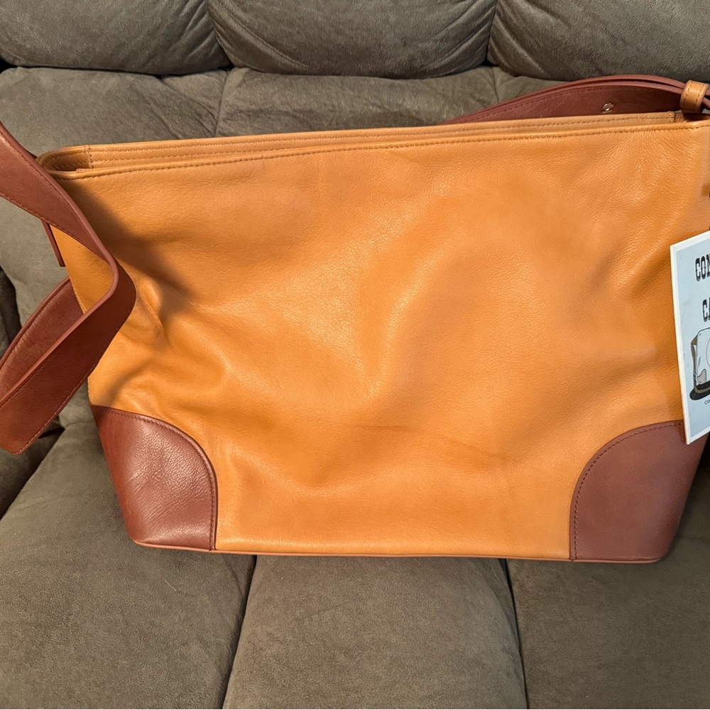 Tan and Brown leather Ducks Unlimited Concealed Carry purse. Never used.